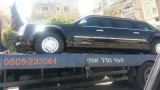 Obamas limousine being towed